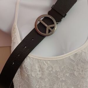 Peace Symbol Buckle on Black Leather Belt